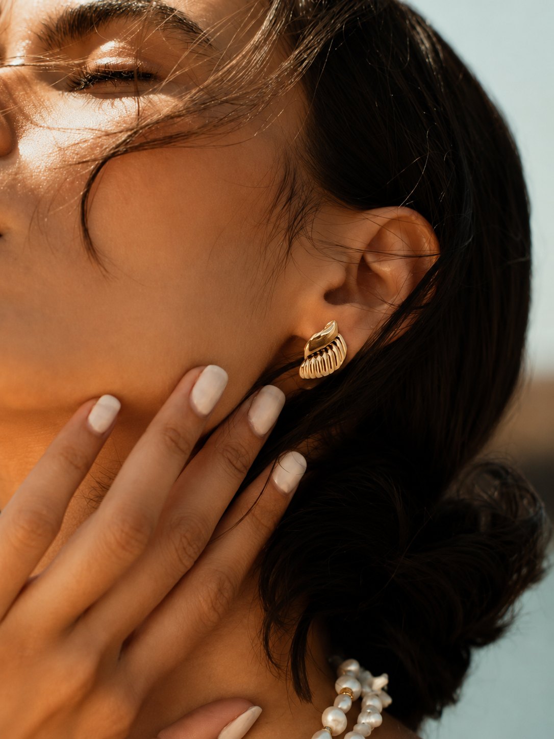 Model wearing amara 18K gold jewellery
