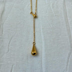 Chic Gold Lariat Necklace with Teardrop Pendants