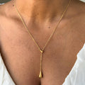 Chic Gold Lariat Necklace with Teardrop Pendants